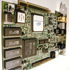 Computer circuit standing up, resembling a building or a bookcase