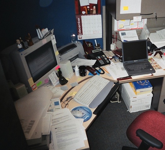 A photograph of a typical office, showing the various types of technology used.